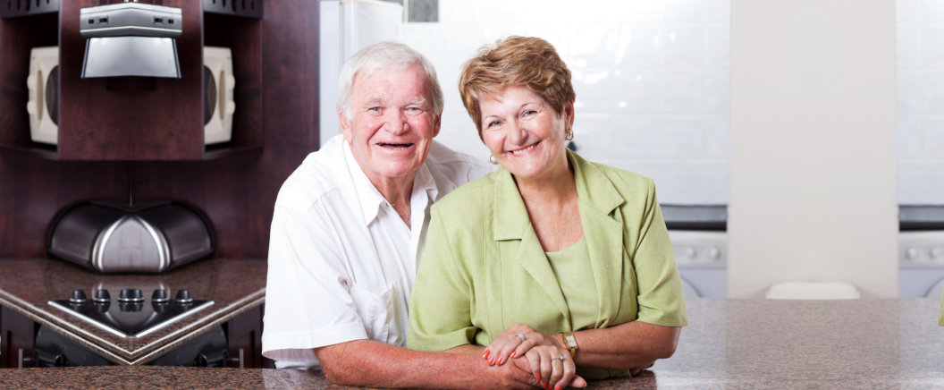 happy loving senior couple portrait at home
